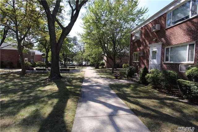 Beautiful 2 Bedroom Deluxe Upper Unit In Courtyard.  Newly Renovated Kitchen. Top Of The Line Cabinets. Walk To Bay Terrace Shopping Center, Library, Bay Terrace Pool Club (Not Part Of Coop), Elementary / Middle School, Express Bus, Bus To Flushing & Lirr.