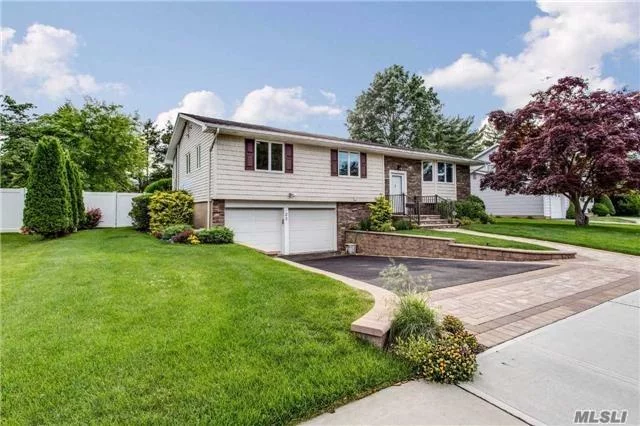 Desirable Neighborhood In Jericho Schools. Nestled On Level .23 Acre, Beautiful Home, Updated Exterior With Cultured Stone Veneer, New Driveway/Walkway & Landscaping Adds Immense Curb Appeal. Natural Light. Enhances Open Floor Plan Interior. Rear Deck/Awning & Many Updates. Convenient To Highways & Shopping.