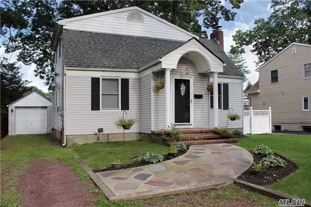 Beautifully Maintained 4 Bedroom, 2 Full Bath Cape In Lovely Neighborhood. Wood Burning Fpl, Open Eat In Kitchen W/Gas Cooking. Second Floor Dormer Offers Generous Space W/2 Bedrooms, Full Bath, Office And Den. Nice Deck And Detached Garage. Gas In Street. Don&rsquo;t Windshield This Property! Make This Your New Home!