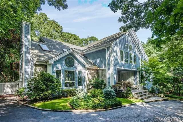 Contemporary Colonial On 1.5 Acre In Nassau County Syosset Schools + 0.5 Acre In Suffolk County Cold Spring Harbor Schools. Triple Car Garage . Private Heated Pool With Waterfall. Large Living Rm, Separate Family Rm, Library Rm.