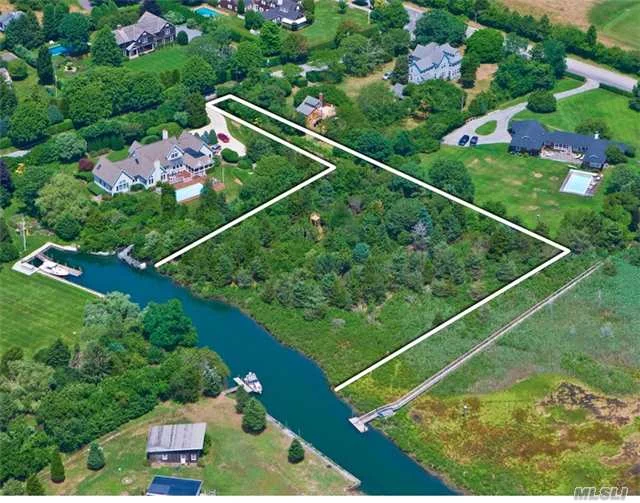 Location, Location, Location! Prime 1.5 Acre Parcel On Deep Water Canal With Dec And Suffolk County Board Of Health Permits For 5, 000+ Sf Home On Two Levels Plus Pool, Detatched 2-Car Garage And Floating 25&rsquo; Dock Which Also Has Proper Permits In Place. Plans Have Been Developed For A Classic Shingle-Style Home By One Of The Hamptons&rsquo; Top Architects.