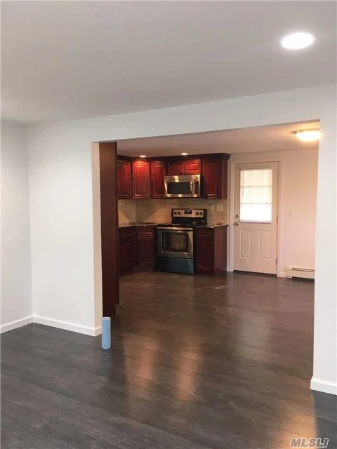 All New Immaculate Ground Level Apartment With New Eik W/Granite And Ss Appliances , Large Lr, Bedroom W/Wic, Office, New Bath, Washer/Dryer In Unit! All Brand New! Use Of Yard! No Pets!