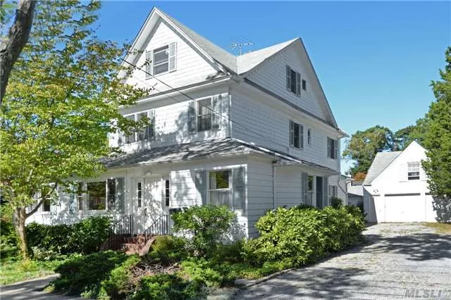 Spacious And Sun-Filled Colonial With Distant Water Views Is Sited On Lovely Flat 100&rsquo;X100&rsquo; Property. Conveniently Located Close To Lirr, Town & Waterfront. 1st Floor: Lr, Dr, Eik, Den, 2Brs, 2Baths, Cac 2nd Floor: Lr, Kitchen, 2 Brs, 1Bath; 3rd Floor 3 Rooms (Storage)/Bath. Detached 2-Car Garage W/Loft, Large Shed, Offered As Is.