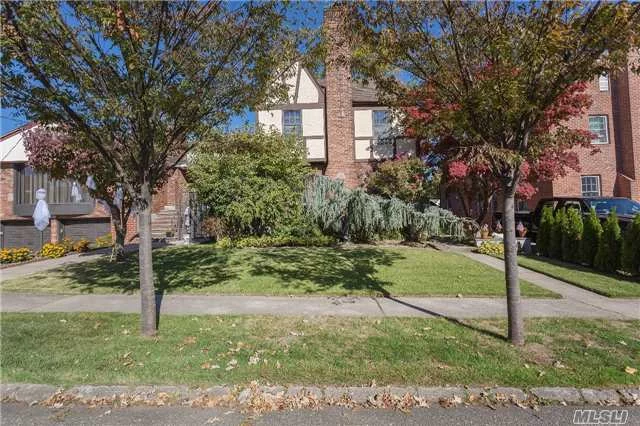 This Charming Brick Tudor Home Is Located In Beechhurst And Its Most Exclusive Area Robinwood - A Roughly 23-Block Southeastern Area That Has Its Own Security Guards. The Property Offers An Interior Classic Rustic Design Throughout The Entire Home. The Property Goes All The Way To 13th Ave. Front Entrances Is In 14th Ave And Garage Entrance In 13th Ave - Side To Side St.