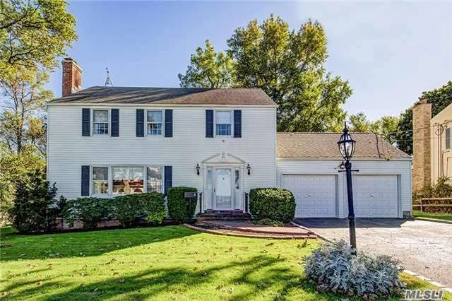 Water Views! Make This Spacious Colonial Your Dream Home. Custom Built For The Owner And Maintained Meticulously With Love . Offering Beautiful Hardwood Floors, Substantial Room Sizes, Including A Large Den Off Of The Kitchen, And Access To The Large Yard From The Kitchen.