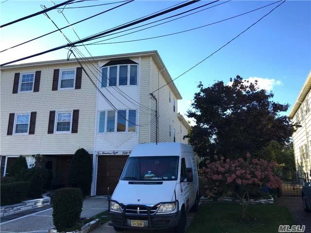 Large 1st Fl Split Triplex 4 Brs, 2.5 Bath Apt In 2 Family House. Renovated And Updated. Excellent Condition. Wrap Around With New Deck. Near Bay And Marina. Dryer And Washer In Unit. 1 Garage And 1 Parking Space. Express Bus To Manhattan.