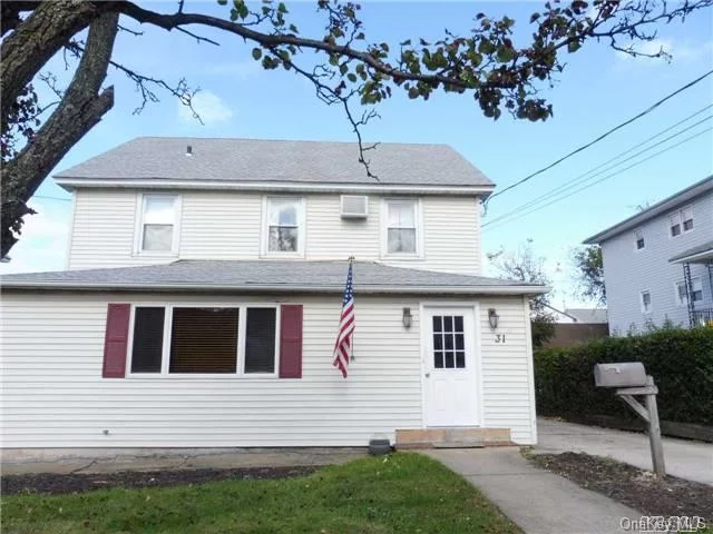 Sunny 2 Bedroom 1 Bath 2nd Floor Home With New Kitchen, Freshly Painted - Landlord Will Install Washer/Dryer Stack Able If Tenant Provides - Large Walk Up Attic For Storage - Landlord Lives On The First Floor - Please Do Not Walk Onto The Property Unless Accompanied With A Realtor And You Have A Confirmed Appointment