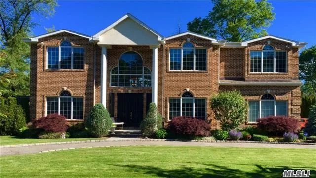 Opportunity Galore!Just Like New!5200 Sqft Young Brick Colonial Offers Great Principle Rms For Entertaining W/High Ceilings, Banquet Sized Dining Rm, 2 Story Den W/Wall Of Glass & Fpl, Chef&rsquo;s Kitchen, Sep Suite W/Br & Bth/Ose On Main Level, Huge Master Suite, Large Bdrms, Beautiful Back Yard/Covered Patio, Full Basement/Lg Windows, Circular Driveway.Famed E. Williston Sd! Must See!