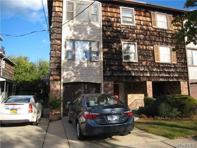 Large Duplex Apt. 3Bedroom, Beautiful Renovated Kitchen, 2 Updated Baths, . Laundry Room. 2 Car Private Parking . Central Air. Freshly Painted.