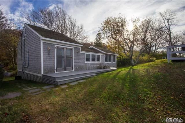 Looking For Privacy In A Getaway Cottage Then This Is It. One Bedroom, One Bath Updated Sound Front Cottage Almost An Acre Of Privacy On This Wooded Land. Open Floor Plan. Plenty Of Room For Expansion