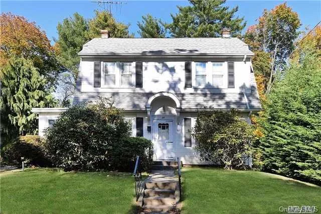 First Time On The Market! **Listening To Offers** Opportunity To Renovate A Charming 3 Bedroom Colonial On A Quiet Residential Street. High Ceilings In This Vintage Home Built 1926. Living Room With Fireplace And Wood Floors Throughout, Formal Dining Room. Private Backyard And 2 Car Detached Garage. Great Location In Locust Valley, Short Distance To Town And Lirr.