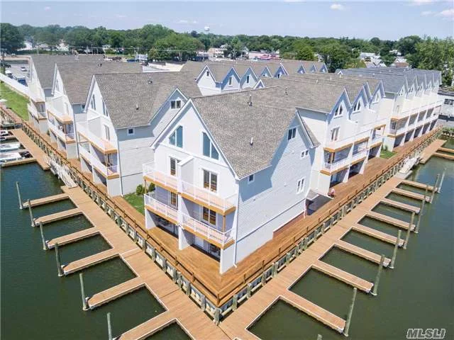 New Construction Townhomes Offering Luxury Living On The Waterfront. Amenities Include: Boat Slip With Each Unit, 2-Car Garage, Guest Parking, Guest Boat Slips, Multi-Level Decks, Stucco/James Hardie Siding, Andersen Windows, Hardwood Floors, Cac, Gas Heat/Cooking, Bonus Room/Office. Waterfront Green W/ Boardwalk & Gazebo, Freeport Electric & Water.