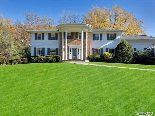 Lake Success - Majestic Center Hall Colonial In A Cul-De-Sac. Master Suite Plus 4 Bedrooms, 3 Full & 2 Half Baths, Renovated Eat-In-Kitchen, , Fireplace, Laundry On Main Level, Beautiful Grounds. Part Of Lake Success Amenities.