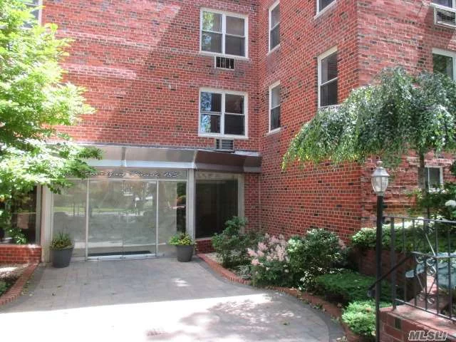 Large Jr 4 Co-Op Facing The South Is Located Close To Lirr, Bus & Shops. Spacious Master Bedroom Features Walk-In-Closet. Bright & Inviting - Offers A Large Living Room & Entry Foyer. Enclosed Dining Room That Can Be Turned Into A Second Bedroom. Hardwood Floors Throughout. Visitors Indoor/Outdoor Parking.