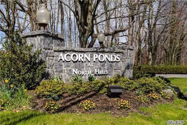 Welcome To Acorn Ponds At North Hills And Enjoy The Fabulous Lifestyle Of This Beautiful Clubhouse Community. This Sunny, Spacious, Impeccable (End-Unit) Dogwood Model Is Move-In Ready! Redone Eat-In Kitchen, Generous Size Living Room W/Marble Fireplace And Hardwood Floors. Upstairs Is The Master Suite And 2 Additional Bedrooms. Patio, Deck, Attached 2-Car Garage, More!