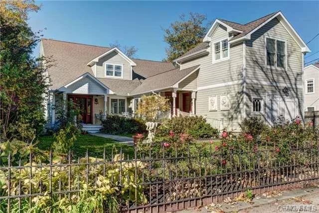 Custom Built Greenport Village Craftsman. From The Charming Iron Gate Entry And Rose Garden Hedge, Many Architectural Details Such As Crown Moulding, Antique Light Fixtures, 2 Fireplaces And Chefs Kitchen Were Thoughtfully Included In This Homes Design. Rackett&rsquo;s Basin Views Enhance The Location Of This Walk To Town Gem On One Of Greenport&rsquo;s Premier Streets.