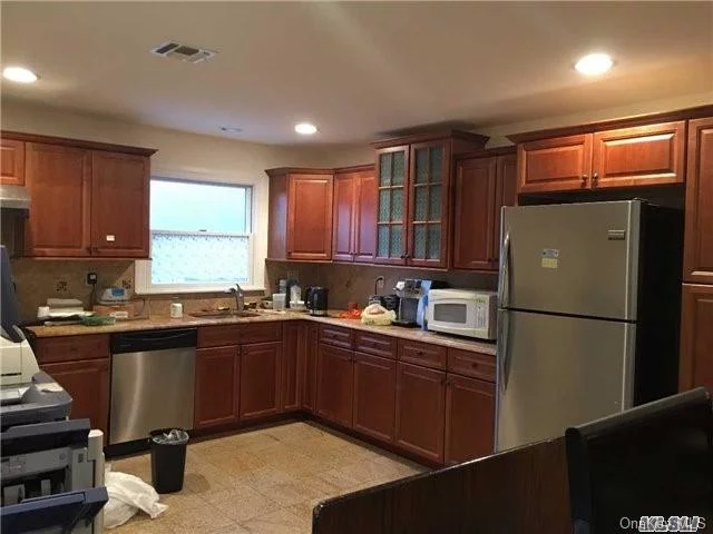 Extra Large 1815 Square Feet First Floor Apartment In Bayside. Excellent School District #26 (Ps203, Ms74 And Cardozo High School). Large Eat-In-Kitchen, Formal Dining Room, Beautiful Hardwood Floor, Close To Shopping And Public Transportation. Must See.