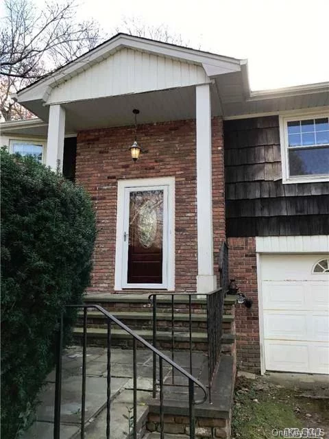 Wonderful 4 Bedroom, 2.5 Bath Hi-Ranch On North Syosset. Hardwood Floors, Large Family Room With Fire Place Large, Open Backyard (Shy 1/2 Acre) With Deck. All Windows Are Upgraded, Central Air Conditioning, Walking Distance To School And Train. Property Lovers Dream House.