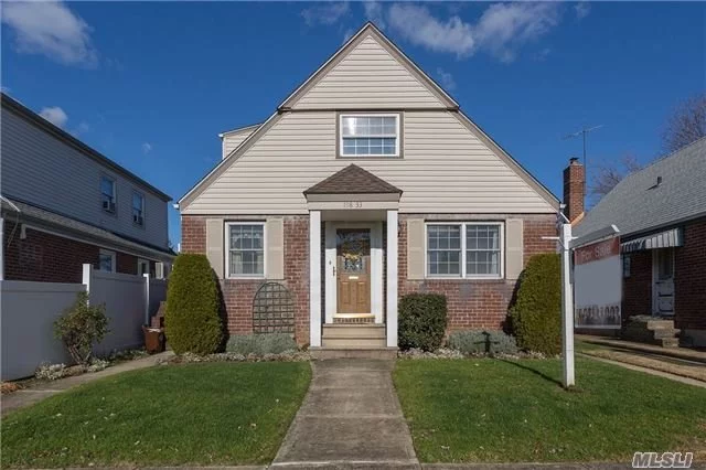 Detached Legal 2 Family Used As A 1 Family, Set Up As A 5 Bedroom, 2 Bath With Finished Basement. Detached Over Sized Garage, 40 X Extra Deep 120 Lot, 2 Split System A/Cs, Anderson Windows, Closets Galore, Gas Heat, Near Shops & Buses. Ps 162 & Ms 158