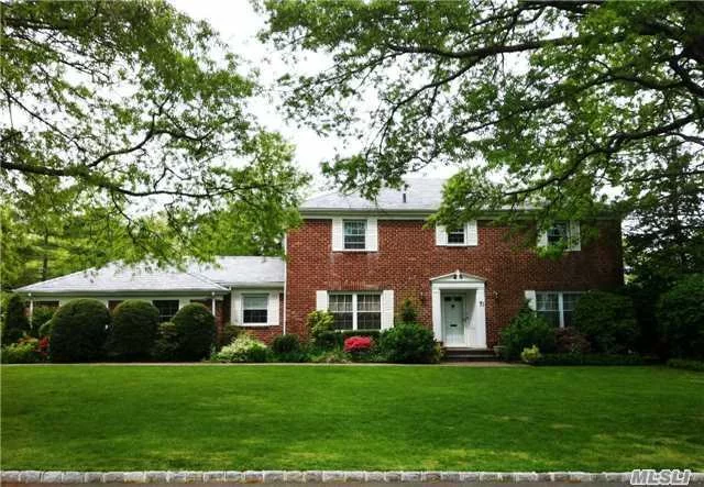 Classic Center Hall Colonial In Munsey Park. Beautiful, Landscaped Property Featuring 4 Bedrooms, 3 Full Baths, Formal Dining Room, Eat-In-Kitchen, Living Room, Den And Finished Basement.