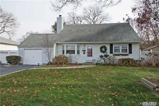 Beautiful 4 Bedroom Home In Desirable West Islip School District. This Home Offers An Open Floor Plan With An Updated Large Eat In Kitchen, Separate Laundry Room Plus 2 Full Baths. Can You Picture Yourself Enjoying The Fabulous Duel Fireplace Situated In-Between The Living Room And Dining Room On Those Cold Winter Evenings? Make This House Your Next Home !