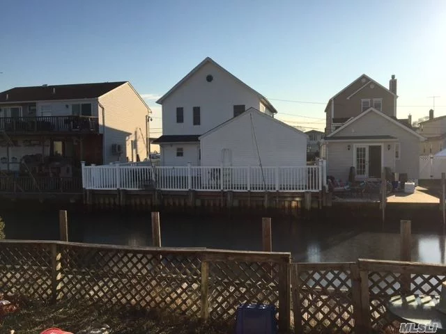 Spacious And Mostly Updated Month To Month Rental W/Opt To Buy In South Bellmore On The Water! . Lg Lr/W Dr Combo W/Wd Fls. Granite Eik W/Skylight And View Of Water, Updated Tiled F/Bth. 2 Bedrooms Upstairs. Tenant To Pay Utilities W/Exception Of Water. Immediate Occupancy. Close To All!