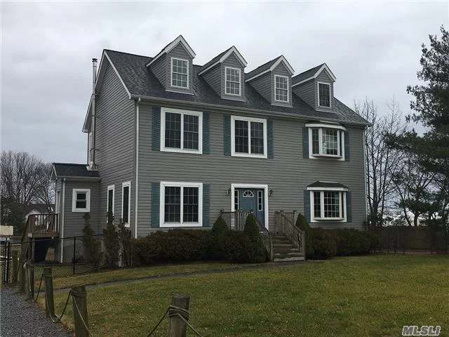 True Center Hall Colonial W/9Ft Ceilings Thru-Out. Home Features 4Br, 2.5 Bath, Master Suite, Family Room W/Fireplace. Huge Cut In Boat Slip For Very Protected Docking.