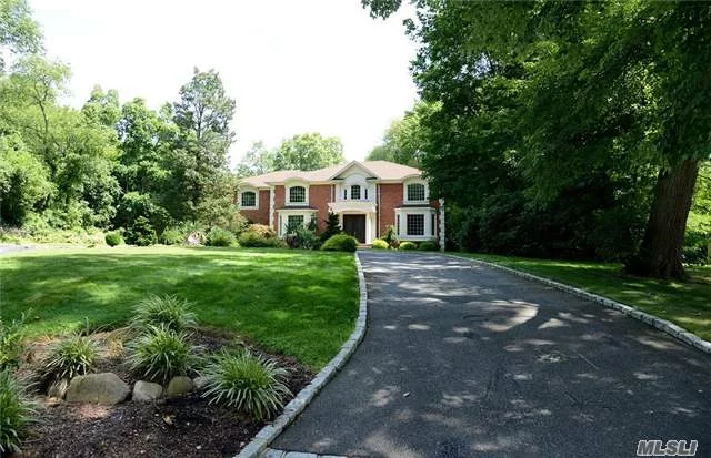 Beautiful Young Brick 2 Story Center Hall Colonial Set On A Shy Acre Of Property. This 6 Bedroom, 4.55 Bath Home Is Perfect For Entertaining On A Grand Scale. Featuring High Ceilings, Breathtaking Bridal Staircase And Detailed Moldings With An Inground Pool And Brick Patio.
