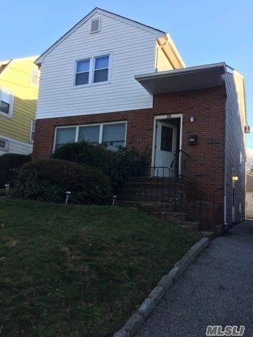 Three Bedroom Colonial Close To Town And Train, Oversized Rooms And Great Closet Space, Wood Floors, Super Storage With Private Backyard.