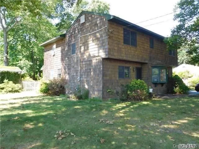 Bayside Community. 2 Story Colonial With Cedar Shake. 2300 Sq Ft With 4 Brs, 2 Baths. Large Rear Deck. Deeded Beach Rights. Needs Some Tlc.