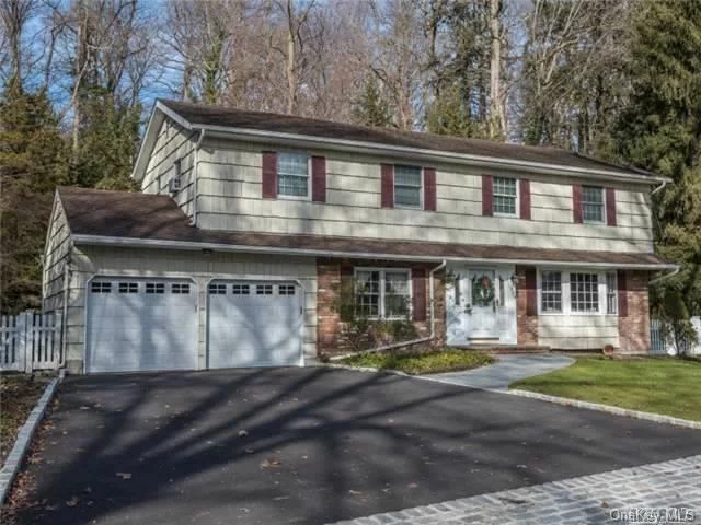 Make This Spacious Colonial Nestled On Over Half An Acre With 2-Car Garage Your Dream Home Come True! With 4 Bedrooms, 3 Baths, Huge Kitchen, Formal Dining Room, Family Room With Fireplace, And Full Basement, This Special Sea Cliff Home Has It All! Award-Winning North Shore Schools.