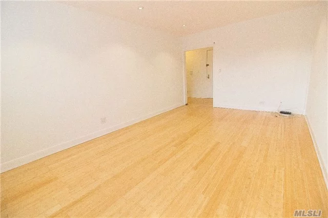 Renovated 2 Bedroom (Corner Apartment). Hardwood Floors. Large Kitchen With Stainless Still App And Granite Countertops. 2 Large Bedrooms With Mirrored Closets. Laundry In The Building. Plenty Of Sunlight. Heat And Hot Water Included. No Pets. All Info Should Be Independently Verified.