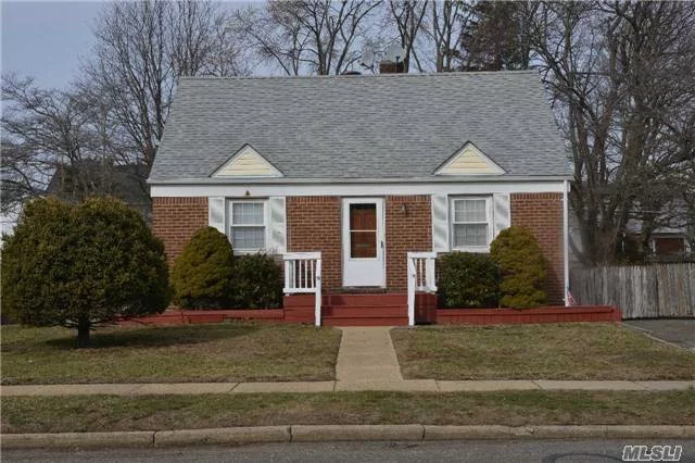 Expanded Cape With A Mid-Block Location In The Desirable Numbered Streets. Hardwood & Laminate Floors, New Hot Water Heater, Replaced Windows, 150 Amp Electric Service, Gas Cooking And Heating, Outside Entrance To Full Basement, Vaulted Ceiling In Dining Room, Oversized Property And More.