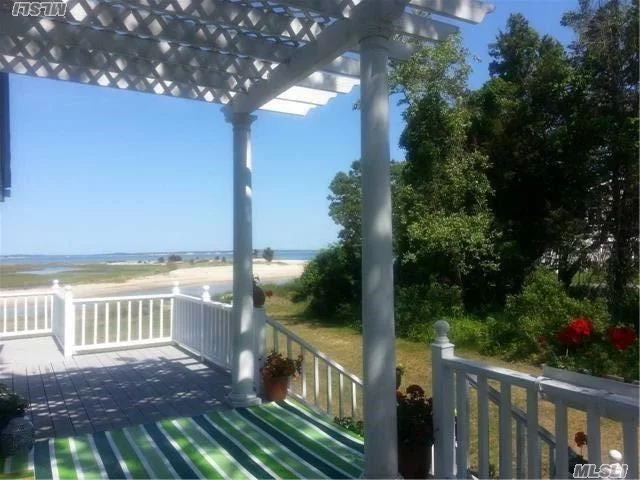 Sun Splashed Three Bedroom, Two Bath Beachfront Cottage In Secluded Cedar Beach, Southold. Centrally Air-Conditioned, Views Of The Hamptons And Shelter Island.