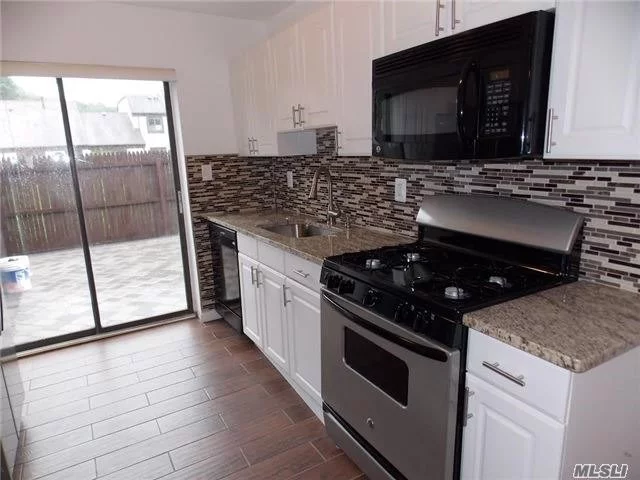 Totally Redone Unit New Kitchen W/Granite, New Floors & New Beautiful Bathroom, Washer & Dryer. Beautiful Deck Patio W/Paver&rsquo;s All On One Level - No One Above You!!!