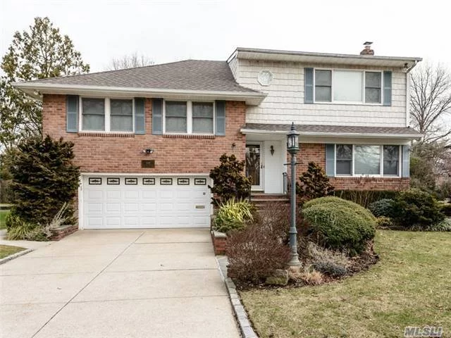 A Spectacular Showcase Home That Has It All! Situated Mid-Block, This Beautiful Expanded Split Home Boasts A Sunken Formal Living Room, Formal Dining Room, Eat-In-Kitchen, 2 Master Bedroom Suites With 3 Additional Spacious Bedrooms, Den W/ Access To A Beautiful Landscaped Backyard And Full Finished Basement. Note: Staircase Chandelier Excluded.