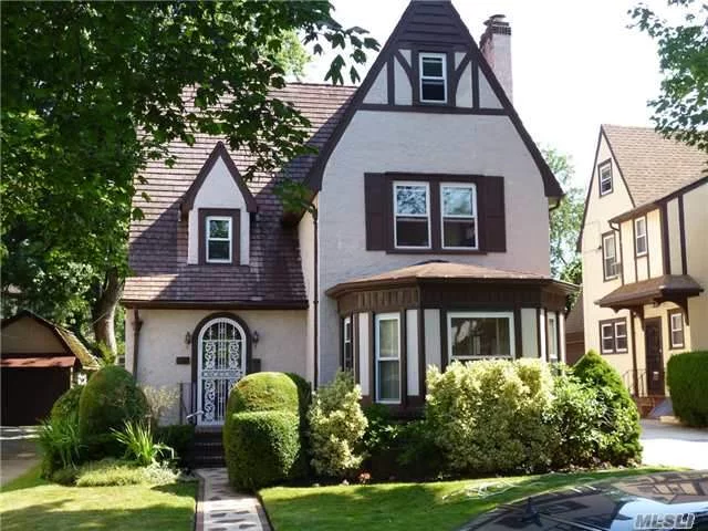 Detached Tudor House Just Outside Forest Hills Gardens. Four Bedroom, Three And A Half Baths, Separate Garage, Fdr, Eik, W/D In Finished Basement. New Kitchen Lovely Yard