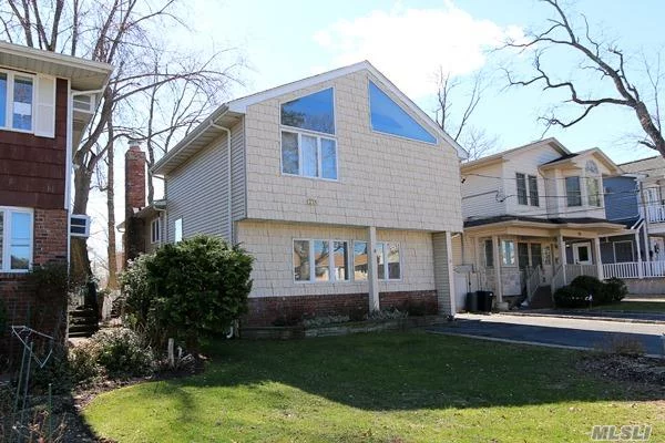 Spacious Multi-Level Contemporary In Excellent Move-In Condition. Large Master Bedroom Suite, Plus 2 Additional Family Bedrooms, Living Room W Wood Burning Fireplace, Eik, Fdr, Much More!! Located On Private Manhasset Isle, Civic Assoc. Avail.