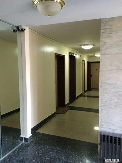 Nicely Maintained, Elevator Building. Super Lives On Site, Laundy Room With Lounge, Small Courtyard And Parking For A Fee. Located Close To Cunningham Park And Less Than 1 Hr To Nyc. Quiet Area A Plus. Living Room Open Space Allows For Plenty Of Sunlight. Closets And Windows In Every Room.