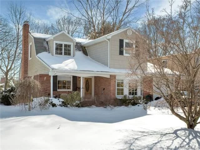 Roslyn Heights Colonial With Brand New Kitchen With Stainless Steel Appliances, Granite Countertops. 3 Bedrooms, 2 Full Baths, Living Room With Fireplace, Formal Dining Room. Landscaped Property.