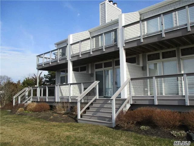 Spectacular, Cleaves Point Townhouse With Panoramic Bay Views To Shelter Island - Lr W/Fp, Hardwood Floors, Deck Overlooking Rolling Lawn Leading To Marina & Beach. Fdr, Updated Eik, Granite Countertops, Tiled Floors, 1/2 Bth, Bayfront Master Bdrm W/Updated Mbth + Deck Overlooking Bay, 2nd Bdrm, Hall Bth, 3rd Flr. Loft, + Full Bth.-Marina, Pool,  Beach, Tennis.
