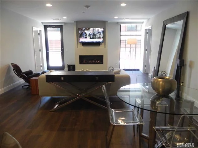 This Top Floor Luxury Rental Residence Boasts Fireplace, Lr/Dining Area W/Ctr Island, Stainless Appliances, Euro Cabinetry. 2Br/2Ba (En Suite Master W/Stall Shower) & Massive Walk In Closet. Full Size W/D. On Site Gym, Roof Deck, Magnificent Lobby. Etc. Enjoy Unrivaled Shopping/Fine Dining In Nearby Roslyn Village. Perfect For The Most Discerning Tenant. Must See!