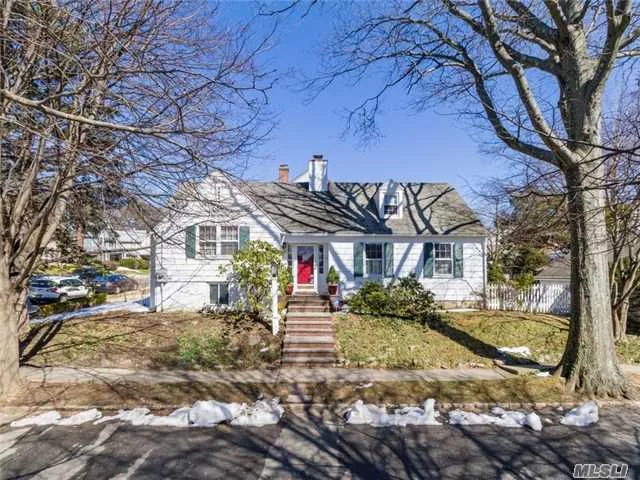 Charming 3-Bedroom Cape In The Heart Of The Park Section Boasting Spacious Sun-Filled Rooms, Quiet Neighborhood Near School, Town And Lirr. Hardwood Floors, Private Yard, Living Room W/Fpl. Low Taxes.