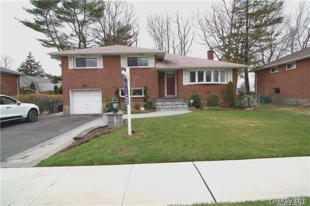 New To Market Quiet Mid Block Location Move In Ready Updated Split With Hw Floors Throughout, Brand New Kitchen, Newly Finished Basement With Lots Of Storage, Extra Deep Garage