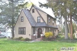 Tudor Home On A Very Quiet Street In Great Neck. Large Rooms With Large Original Moldings & Curved Plaster Ceilings. Lakeville, Great Neck South Schools,  Close To Shopping, Highways & Lirr. Great Potential With Tlc, Beautiful Community, Parks And Schools!