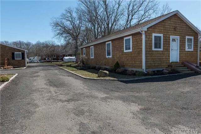 Well Maintained One Bedroom Cottage With Washer And Dryer In Unit. Wood Floors Throughout. Private Entrance And Designated Parking Area. Slider To Side Deck. Includes Sanitation, And Ground Care. Located Conveniently In Mattituck Hamlet Compound Off Main Rd. Excellent Long Term Rental Opportunity. Now Accepting Applications.