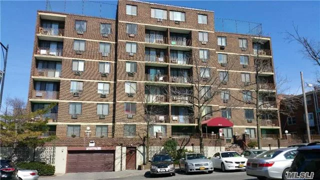 Large And Bright 2 Bedrooms Condo In The Heart Of Flushing, Nice & Clean, Hard Wood Floors, Heat Included, Parking Space (Extra $100), 3 Blocks To 7 Train & Lirr