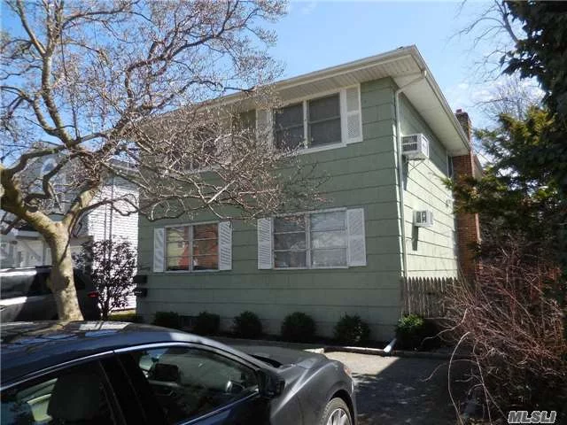 Location! Location! Move Right Into A Fully Renovated 2nd Floor 2 Beds And 1 Bath In Desirable Manhasset Isle Featuring New Hardwood Floors Throughout, Stainless Steel Appliances, Porch,  Storage Area And Laundry Room. Driveway For 1 Car. Tenant Pays For Utilities. Available Immediately.