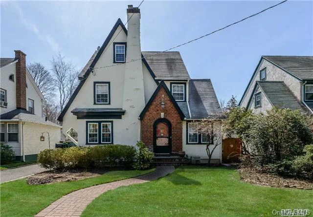 Timeless Tudor Move In Ready. Set On Tree Lined Street Minutes To Parks, Beaches, Schools And Village. Wonderful Flow Throughout This Spacious Four Bedroom Home With Potential In Basement For More Living Space. The House Easily Flows Outside To Two Private Terraces And Fenced In Yard. Simply Charming!!!