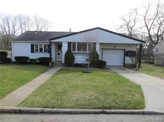 Nicely Updated 3 Bedroom Ranch With 1.5 Baths, Large Eat In Kitchen, Wood Floors, Stainless Steel Appliances, Central Air, Full Basement And 1.5 Garage. Solar City Solar Panels For Low Electric Bill. Large Backyard With Sachem Schools!!